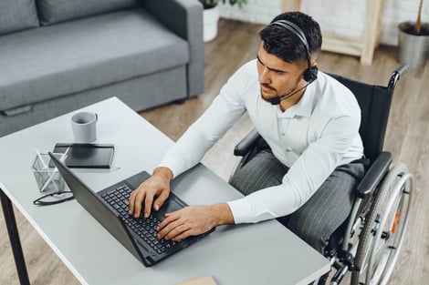 disabled man working from home